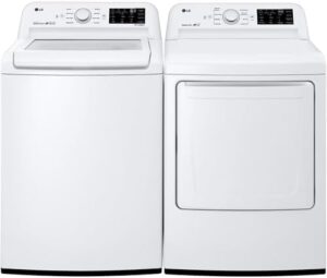 LG WT7100CW 5.2 cu.ft Top Load Washer with 6Motion Technology in a modern laundry room, showcasing its sleek design and large capacity.