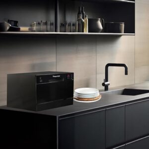 Magic Chef Countertop Portable Dishwasher in Black, showcasing its compact design and electronic controls.