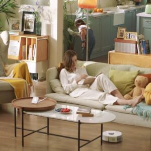 SwitchBot Mini Robot Vacuum K10+ in action on a hardwood floor