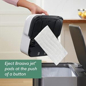 iRobot Braava Jet M6 robot mop on a tile floor with a washable wet mopping pad attached