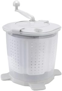 Portable manual washing machine with suction cup feet, ideal for apartments and small spaces