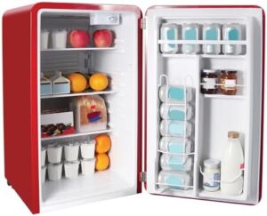 Magic Chef MCR32CHR Compact Refrigerator in red, placed in a modern office setting