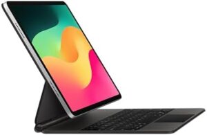 Magic Keyboard for iPad Pro 12.9" and iPad Air in black, showing built-in trackpad and keys